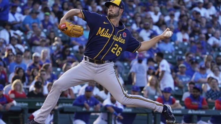 May 30, 2022; Chicago, Illinois, USA; Milwaukee Brewers starting pitcher Aaron Ashby (26) throws a pitch against the Chicago Cubs during the first inning at Wrigley Field. Mandatory Credit: David Banks-USA TODAY Sports