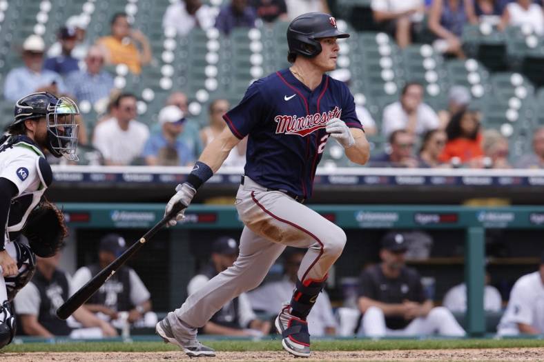 May 31, 2022; Detroit, Michigan, USA; Minnesota Twins designated hitter Max Kepler (26) hits a two RBI single in the seventh inning against the Detroit Tigers at Comerica Park. Mandatory Credit: Rick Osentoski-USA TODAY Sports