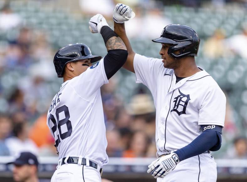 May 31, 2022; Detroit, Michigan, USA; Detroit Tigers designated hitter Jonathan Schoop (right) celebrates with shortstop Javier Baez (28) after hitting a two run home run during the first inning against the Minnesota Twins at Comerica Park. Mandatory Credit: Raj Mehta-USA TODAY Sports