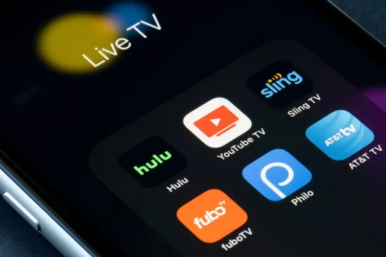 Hulu and Fubo logos on smartphone