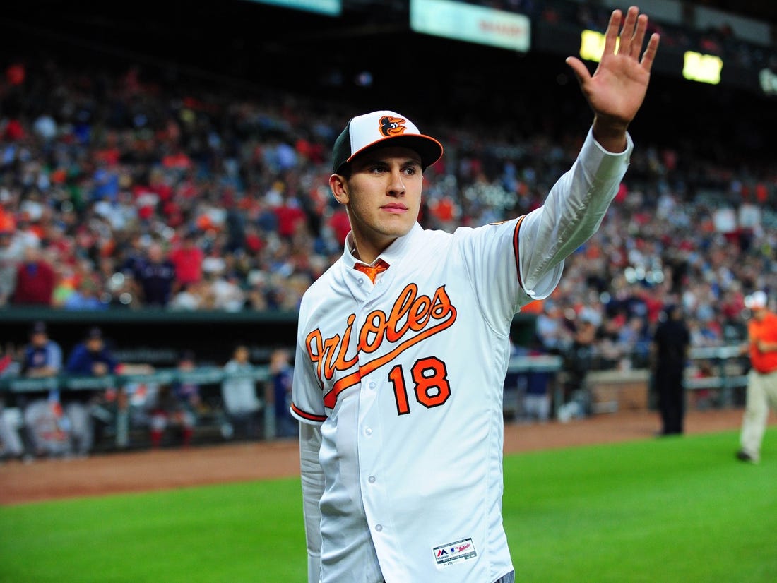 Jun 12, 2018; Baltimore, MD, USA; Baltimore Orioles first round draft pick Grayson Rodriguez (18) waves to the crowd after being introduced during the game against the Boston Red Sox at Oriole Park at Camden Yards. Mandatory Credit: Evan Habeeb-USA TODAY Sports