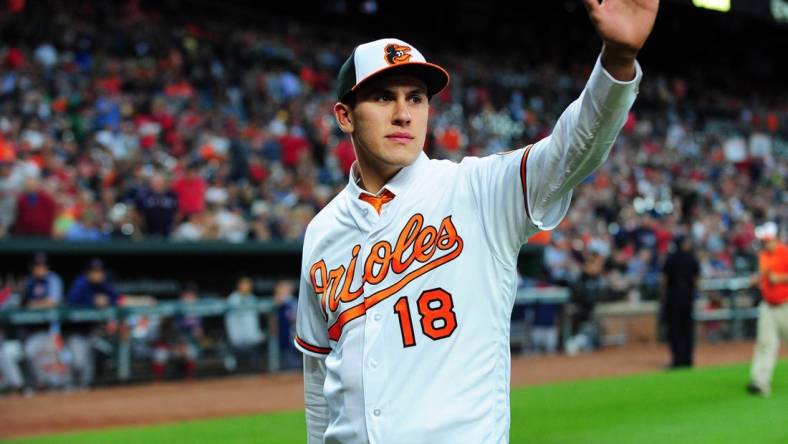 Jun 12, 2018; Baltimore, MD, USA; Baltimore Orioles first round draft pick Grayson Rodriguez (18) waves to the crowd after being introduced during the game against the Boston Red Sox at Oriole Park at Camden Yards. Mandatory Credit: Evan Habeeb-USA TODAY Sports