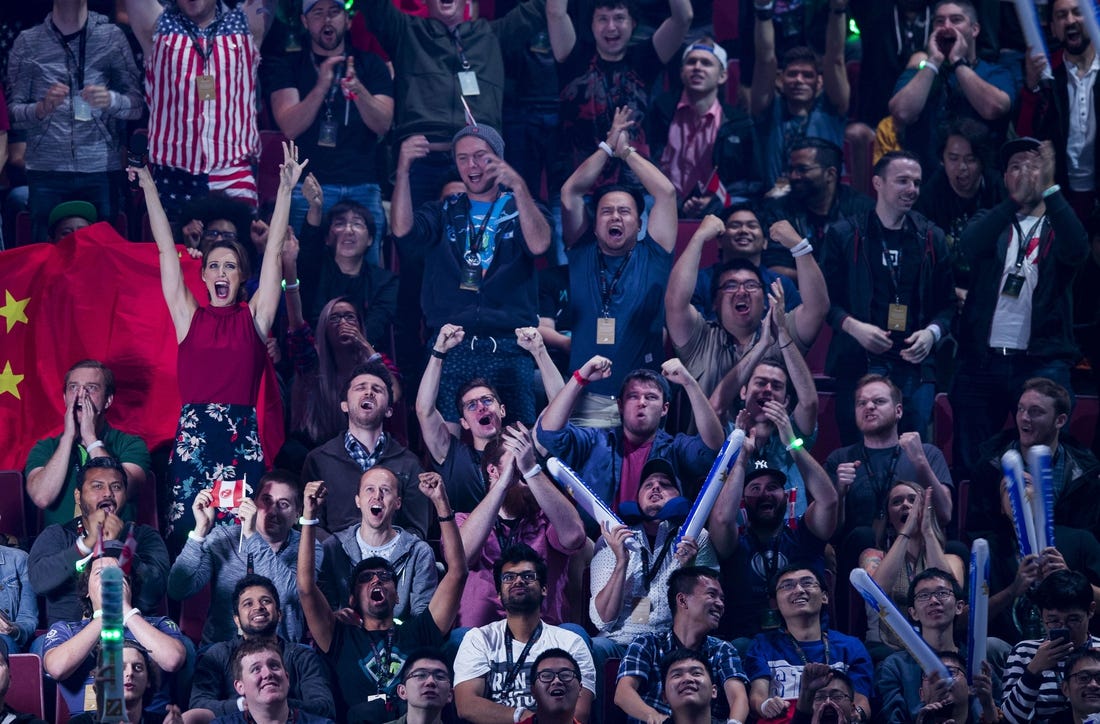 Aug 25, 2018; Vancouver, British Columbia, CAN; Fans watch as Team Evil Geniuses  plays Team LGD in the lower bracket final of the International Dota 2 Championships at Rogers Arena in Vancouver.  The championships are eSports largest annual tournament with approximately $25 million U.S. in prize money to be awarded.  Dota 2 is a free 10-player online video game with two teams of players from all over the world competing against one another in each game. Mandatory Credit: Bob Frid-USA TODAY Sports