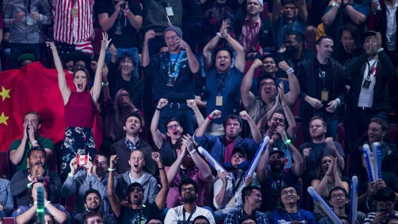 Aug 25, 2018; Vancouver, British Columbia, CAN; Fans watch as Team Evil Geniuses  plays Team LGD in the lower bracket final of the International Dota 2 Championships at Rogers Arena in Vancouver.  The championships are eSports largest annual tournament with approximately $25 million U.S. in prize money to be awarded.  Dota 2 is a free 10-player online video game with two teams of players from all over the world competing against one another in each game. Mandatory Credit: Bob Frid-USA TODAY Sports