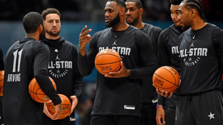 Feb 16, 2019; Charlotte, NC, USA; Team Lebron forward Lebron James of the Los Angeles Lakers (23) talks with Team Lebron guard Kyrie Irving of the Boston Celtics (11) during NBA All-Star Game practice at the Bojangles Coliseum. Mandatory Credit: Bob Donnan-USA TODAY Sports