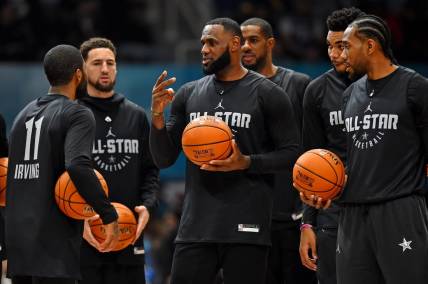 Feb 16, 2019; Charlotte, NC, USA; Team Lebron forward Lebron James of the Los Angeles Lakers (23) talks with Team Lebron guard Kyrie Irving of the Boston Celtics (11) during NBA All-Star Game practice at the Bojangles Coliseum. Mandatory Credit: Bob Donnan-USA TODAY Sports