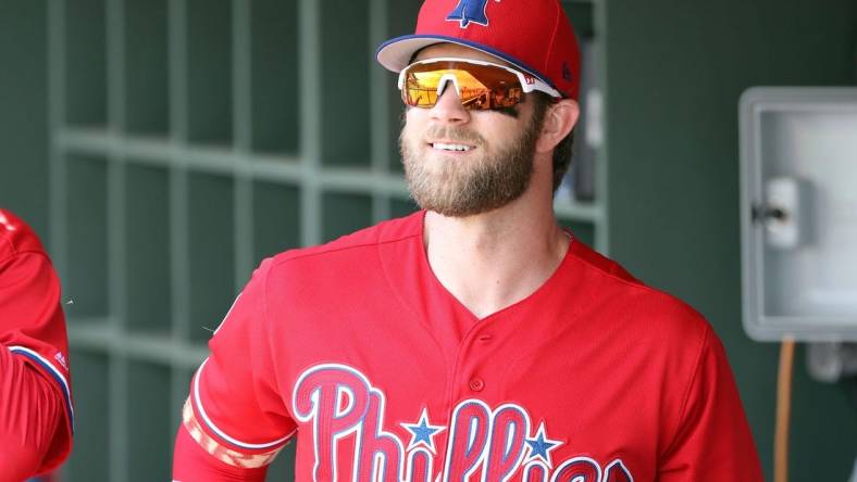 Mar 11, 2019; Clearwater, FL, USA; Philadelphia Phillies right fielder Bryce Harper (3) smiles in the dugout before  the game against the Tampa Bay Rays at Spectrum Field. Mandatory Credit: Kim Klement-USA TODAY Sports