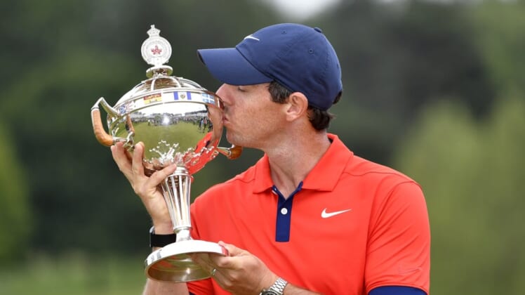 Jun 9, 2019; Hamilton, Ontario, CAN; Rory McIlroy poses with the trophy after winning the 2019 RBC Canadian Open golf tournament at Hamilton Golf & Country Club. Mandatory Credit: Eric Bolte-USA TODAY Sports