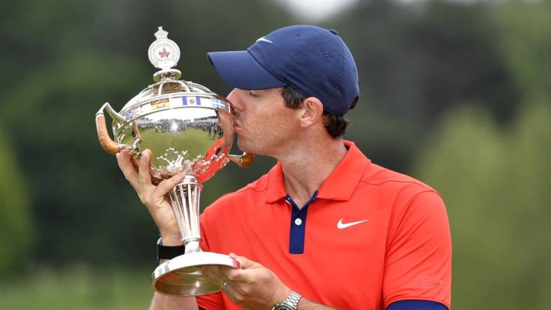 Jun 9, 2019; Hamilton, Ontario, CAN; Rory McIlroy poses with the trophy after winning the 2019 RBC Canadian Open golf tournament at Hamilton Golf & Country Club. Mandatory Credit: Eric Bolte-USA TODAY Sports