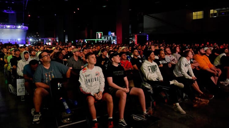 Jul 21, 2019; Miami Beach, FL, USA; Fans watch the gameplay between Reciprocity and GEN.G during the Call of Duty League Finals e-sports event at Miami Beach Convention Center. Mandatory Credit: Jasen Vinlove-USA TODAY Sports