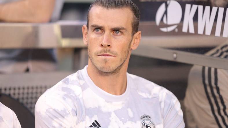 Jul 26, 2019; East Rutherford, NJ, USA; Real Madrid forward Gareth Bale (11) sits on the bench prior to an International Champions Cup soccer series match against Atletico de Madrid at MetLife Stadium. Mandatory Credit: Brad Penner-USA TODAY Sports