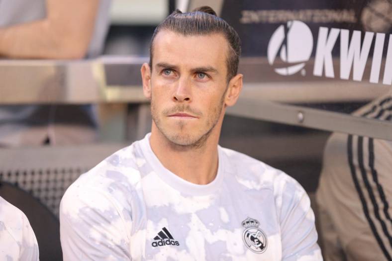 Jul 26, 2019; East Rutherford, NJ, USA; Real Madrid forward Gareth Bale (11) sits on the bench prior to an International Champions Cup soccer series match against Atletico de Madrid at MetLife Stadium. Mandatory Credit: Brad Penner-USA TODAY Sports
