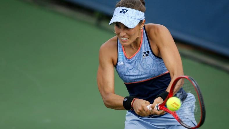 Monica Puig returns a serve in the second set during the Western & Southern Open match between Monica Puig and Yafan Wang at the Lindner Family Tennis Center in Mason, Ohio, on Tuesday, Aug. 13, 2019. Wang advanced with a 3-6, 7-5, 6-3 win. 

Monica Puig Vs Yafan Wang Western Southern Open