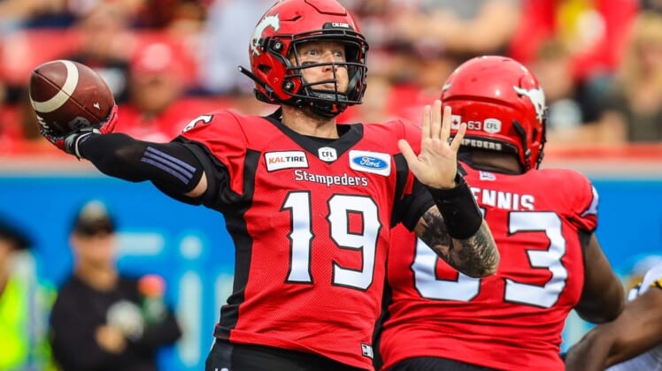 Sep 14, 2019; Calgary, Alberta, CAN; Calgary Stampeders quarterback Bo Levi Mitchell (19) throws a pass against the Hamilton Tiger-Cats in the first half during a Canadian Football League game at McMahon Stadium. Mandatory Credit: Sergei Belski-USA TODAY Sports