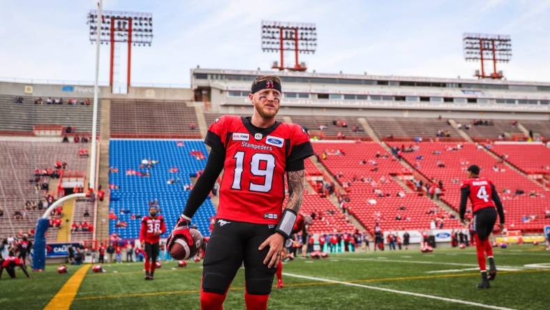 Sep 14, 2019; Calgary, Alberta, CAN; Calgary Stampeders quarterback Bo Levi Mitchell (19) warmups prior to the game against the Hamilton Tiger-Cats during a Canadian Football League game at McMahon Stadium. Mandatory Credit: Sergei Belski-USA TODAY Sports