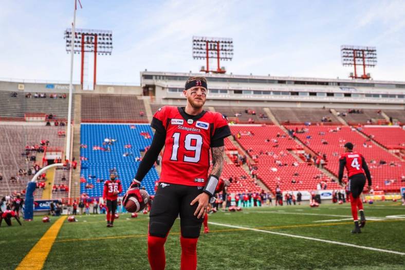 Sep 14, 2019; Calgary, Alberta, CAN; Calgary Stampeders quarterback Bo Levi Mitchell (19) warmups prior to the game against the Hamilton Tiger-Cats during a Canadian Football League game at McMahon Stadium. Mandatory Credit: Sergei Belski-USA TODAY Sports