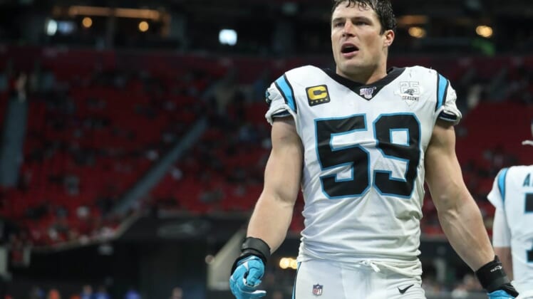 Dec 8, 2019; Atlanta, GA, USA; Carolina Panthers middle linebacker Luke Kuechly (59) greets teammates after a touchdown in the fourth quarter against the Atlanta Falcons at Mercedes-Benz Stadium. Mandatory Credit: Jason Getz-USA TODAY Sports
