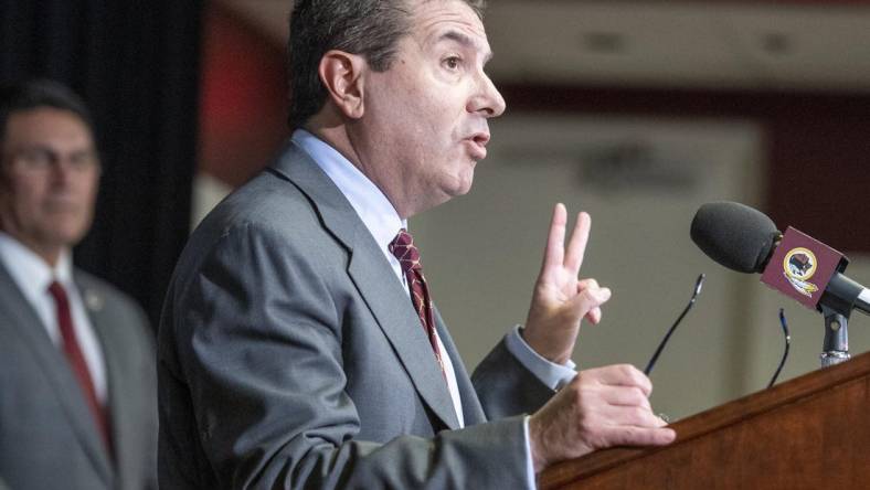 Jan 2, 2020; Ashburn, VA, USA; Washington Redskins head coach Ron Rivera looks on as owner Daniel Snyder speaks during his introductory press conference at Inova Sports Performance Center. Mandatory Credit: Brad Mills-USA TODAY Sports