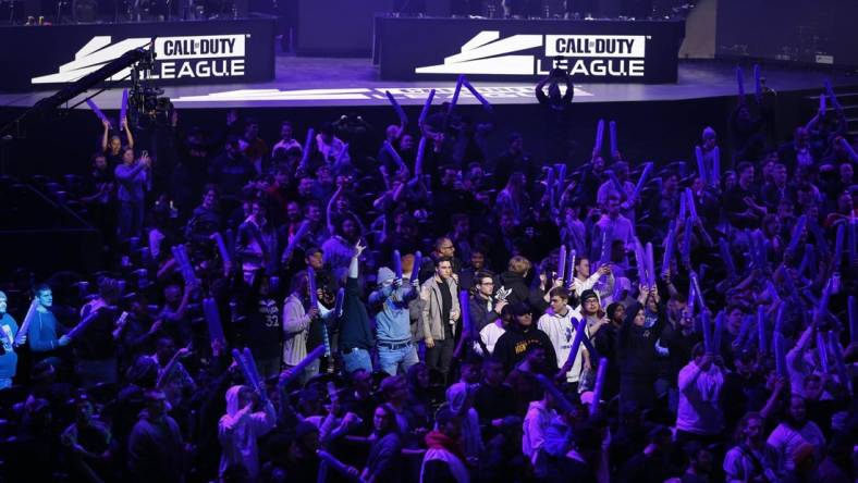 Jan 24, 2020; Minneapolis, Minnesota, USA; Fans cheer for a camera shot of themselves at the start of the Call of Duty League Launch Weekend at The Armory. Mandatory Credit: Bruce Kluckhohn-USA TODAY Sports