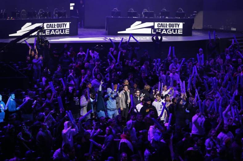 Jan 24, 2020; Minneapolis, Minnesota, USA; Fans cheer for a camera shot of themselves at the start of the Call of Duty League Launch Weekend at The Armory. Mandatory Credit: Bruce Kluckhohn-USA TODAY Sports