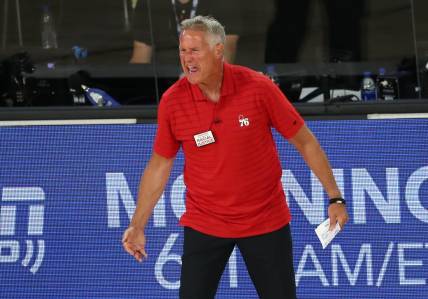 Aug 23, 2020; Lake Buena Vista, Florida, USA; Philadelphia 76ers head coach Brett Brown reacts after receiving a technical foul against the Boston Celtics during the third quarter in game four of an NBA basketball first-round playoff series at The Field House. Mandatory Credit: Kim Klement-USA TODAY Sports