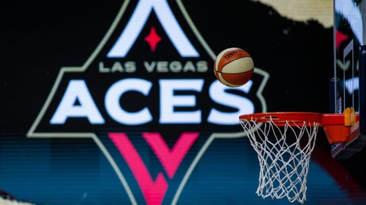 Oct 2, 2020; Bradenton, Florida, USA; A game ball falls through the net as the Las Vegas Aces warm up before game 1 of the WNBA finals against the Seattle Storm at IMG Academy. Mandatory Credit: Mary Holt-USA TODAY Sports