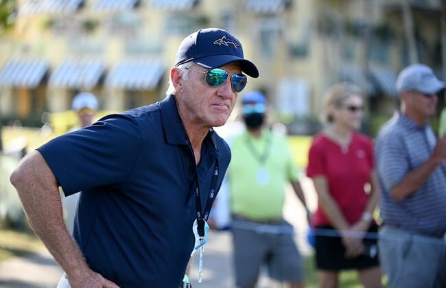 Dec 13, 2020; Naples, FL, USA; Greg Norman watches play on the 18th green during the QBE Shootout at the Tibur n Golf Club. Mandatory credit: Chris Tilley/Naples Daily News via USA TODAY Network
