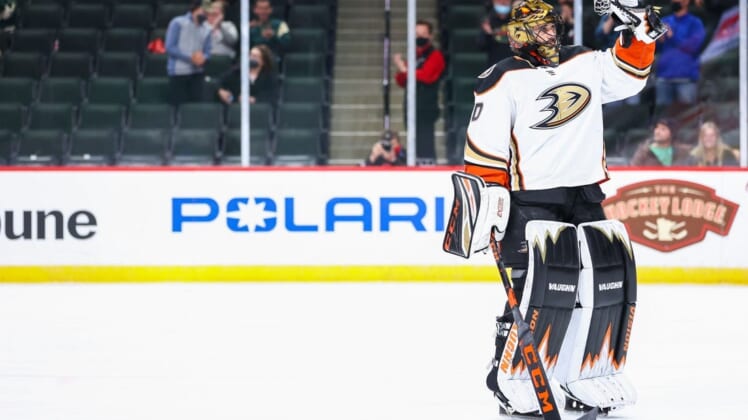 May 8, 2021; Saint Paul, Minnesota, USA; Anaheim Ducks goaltender Ryan Miller (30) acknowledges the crowd after being recognized by the Minnesota Wild for his career and retirement during the first period at Xcel Energy Center. Mandatory Credit: Harrison Barden-USA TODAY Sports