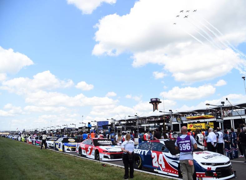Jun 20, 2021; Nashville, Tennessee, USA; View of a flyover at the end of the national anthem before the Ally 400 at Nashville Superspeedway. Mandatory Credit: Christopher Hanewinckel-USA TODAY Sports