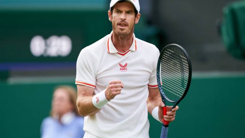 Jun 28, 2021; London, United Kingdom; Andy Murray (GBR) reacts against Nikoloz Basilashvili (GE) on the Centre Court in the first round at All England Lawn Tennis and Croquet Club. Mandatory Credit: Peter van den Berg-USA TODAY Sports