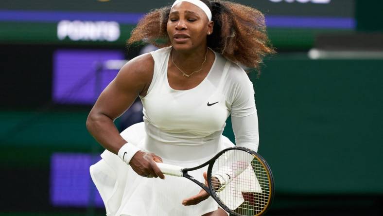 Jun 29, 2021; London, United Kingdom;  Serena Williams (USA) reacts while playing Aliaksandra Sasnovich (BLR) in first round ladies singles on centre court at All England Lawn Tennis and Croquet Club. 
 Mandatory Credit: Peter Van den Berg-USA TODAY Sports