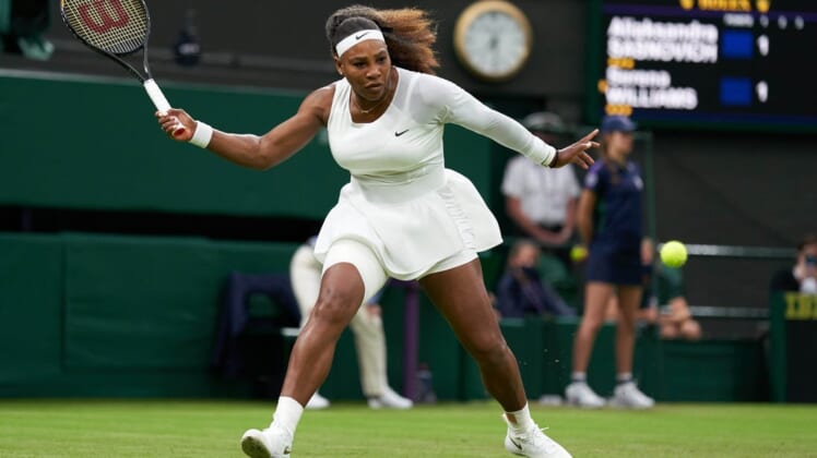 Jun 29, 2021; London, United Kingdom;  Serena Williams (USA) seen playing Aliaksandra Sasnovich (BLR) in first round ladies singles on centre court at All England Lawn Tennis and Croquet Club.  Mandatory Credit: Peter Van den Berg-USA TODAY Sports