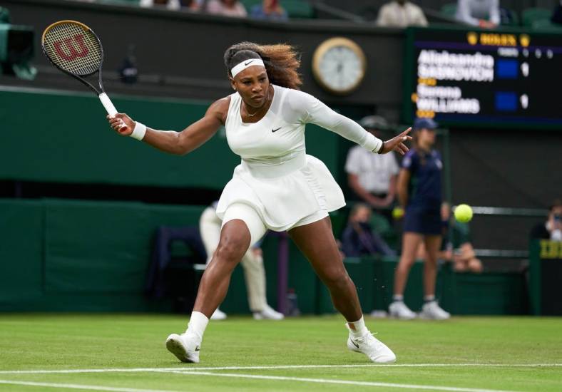Jun 29, 2021; London, United Kingdom;  Serena Williams (USA) seen playing Aliaksandra Sasnovich (BLR) in first round ladies singles on centre court at All England Lawn Tennis and Croquet Club. 
 Mandatory Credit: Peter Van den Berg-USA TODAY Sports