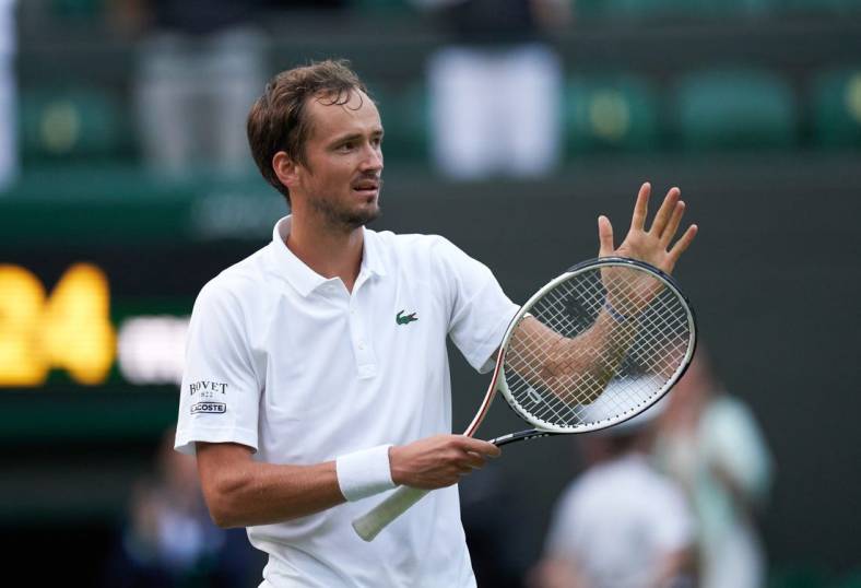 Jul 3, 2021; London, United Kingdom;  
Daniil Medvedev (RUS) seen celebrating after beating Marin Cilic (CRO) on No 1 court in the men s third round at All England Lawn Tennis and Croquet Club. Mandatory Credit: Peter van den Berg-USA TODAY Sports