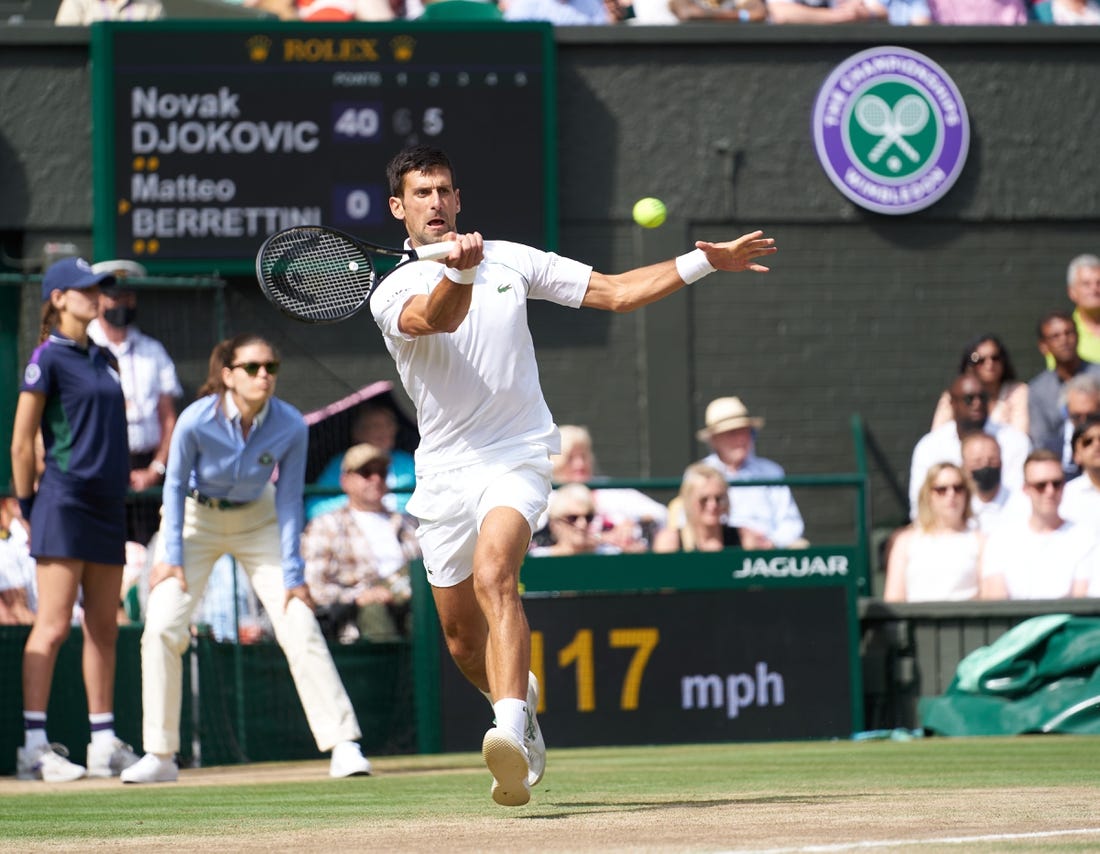 Jul 11, 2021; London, United Kingdom; Novak Djokovic (SRB) plays against Matteo Berrettini (ITA) in the men s final on Centre Court at All England Lawn Tennis and Croquet Club. Mandatory Credit: Peter van den Berg-USA TODAY Sports