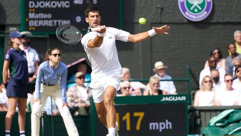 Jul 11, 2021; London, United Kingdom; Novak Djokovic (SRB) plays against Matteo Berrettini (ITA) in the men s final on Centre Court at All England Lawn Tennis and Croquet Club. Mandatory Credit: Peter van den Berg-USA TODAY Sports