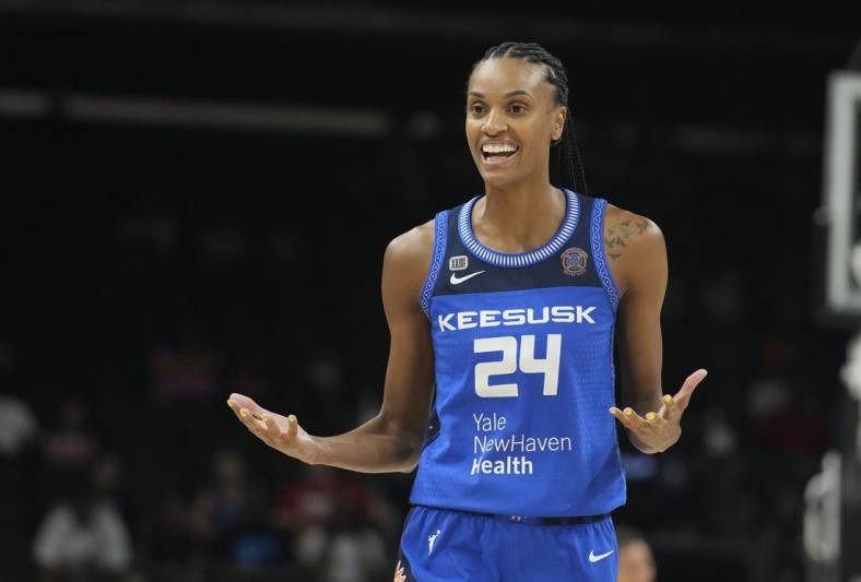 Aug 12, 2021; Phoenix, Arizona, USA; Connecticut Sun guard DeWanna Bonner (24) reacts after a foul call in the first half against the Seattle Storm during the Inaugural WNBA Commissioners Cup Championship Game at Footprint Center. Mandatory Credit: Rick Scuteri-USA TODAY Sports