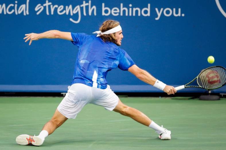 Stefanos Tsitsipas returns a shot during a match between Lorenzo Sonego (ITA) and Stefanos Tsitsipas (GRE) in the Western & Southern Open at the Lindner Family Tennis Center in Mason, Ohio on Thursday, Aug. 19, 2021. Tsitsipas won 5-7, 6-3, 6-4.