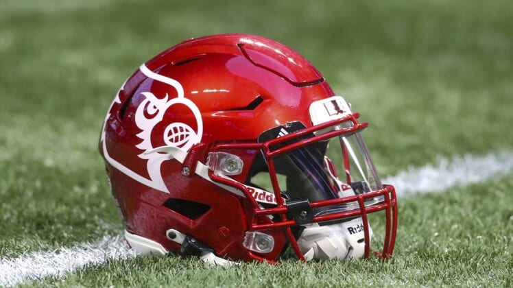 Sep 6, 2021; Atlanta, Georgia, USA; Detailed view of a Louisville Cardinals helmet on the field before a game against the Mississippi Rebels at Mercedes-Benz Stadium. Mandatory Credit: Brett Davis-USA TODAY Sports