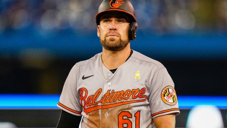 Sep 1, 2021; Toronto, Ontario, CAN; Baltimore Orioles catcher Austin Wynns (61) looks on against the Toronto Blue Jays at Rogers Centre. Mandatory Credit: Kevin Sousa-USA TODAY Sports