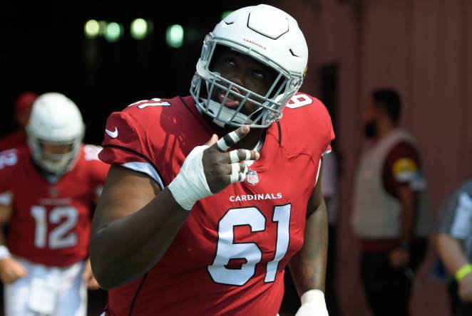 Sep 12, 2021; Nashville, Tennessee, USA;  Arizona Cardinals center Rodney Hudson (61) takes the field during the first half against the Tennessee Titans at Nissan Stadium. Mandatory Credit: Steve Roberts-USA TODAY Sports