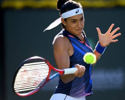 Oct 9, 2021; Indian Wells, CA, USA;  Caroline Garcia (FRA) hits a shot during her second round match against Cori  Coco  Gauff (USA) in the BNP Paribas Open at the Indian Wells Tennis Garden. Mandatory Credit: Jayne Kamin-Oncea-USA TODAY Sports