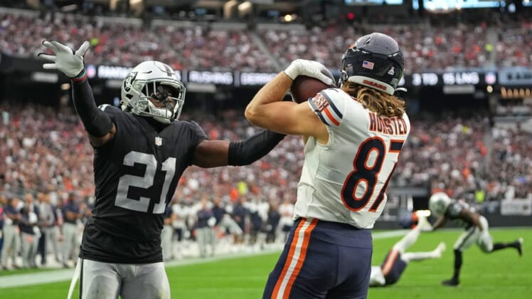 Oct 10, 2021; Paradise, Nevada, USA; Chicago Bears tight end Jesper Horsted (87) makes a touchdown catch as Las Vegas Raiders cornerback Amik Robertson (21) defends the play during a game at Allegiant Stadium. Mandatory Credit: Stephen R. Sylvanie-USA TODAY Sports