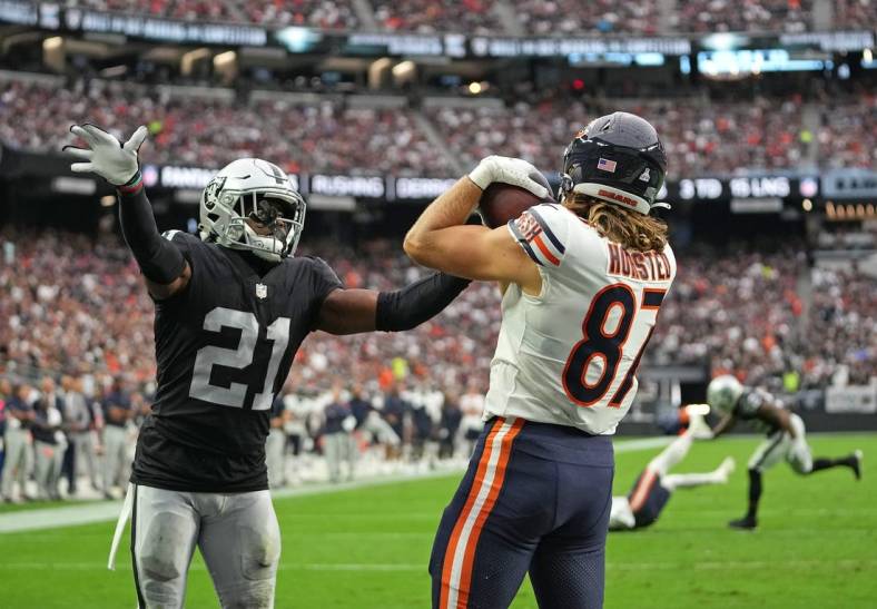 Oct 10, 2021; Paradise, Nevada, USA; Chicago Bears tight end Jesper Horsted (87) makes a touchdown catch as Las Vegas Raiders cornerback Amik Robertson (21) defends the play during a game at Allegiant Stadium. Mandatory Credit: Stephen R. Sylvanie-USA TODAY Sports