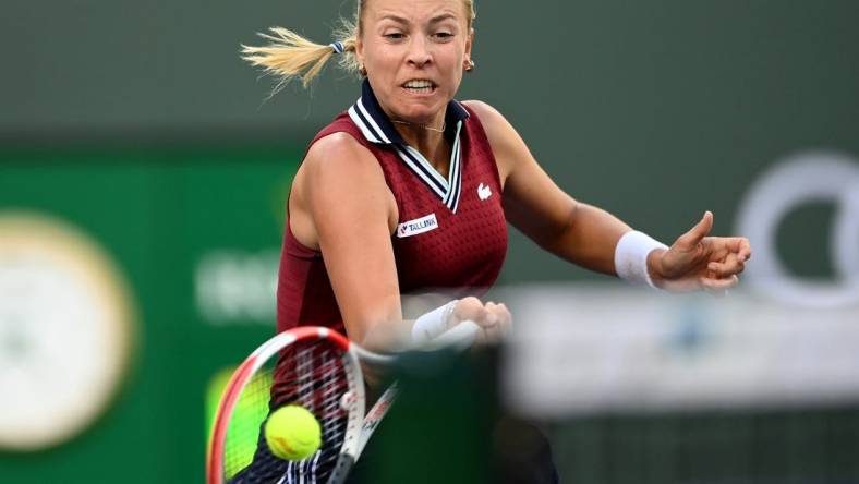 Oct 14, 2021; Indian Wells, CA, USA; Anett Kontaveit (EST) hits a shot against Ons Jabeur (TUN) in their quarterfinal match during the BNP Paribas Open at the Indian Wells Tennis Garden. Mandatory Credit: Jayne Kamin-Oncea-USA TODAY Sports