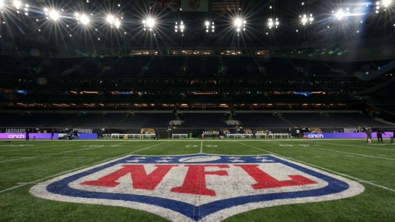 Oct 17, 2021; London, England, United Kingdom; A general overall view of the NFL Shield logo at midfield during an NFL International Series game between the Miami Dolphins and the Jacksonville Jaguars at Tottenham Hotspur Stadium.  Mandatory Credit: Kirby Lee-USA TODAY Sports