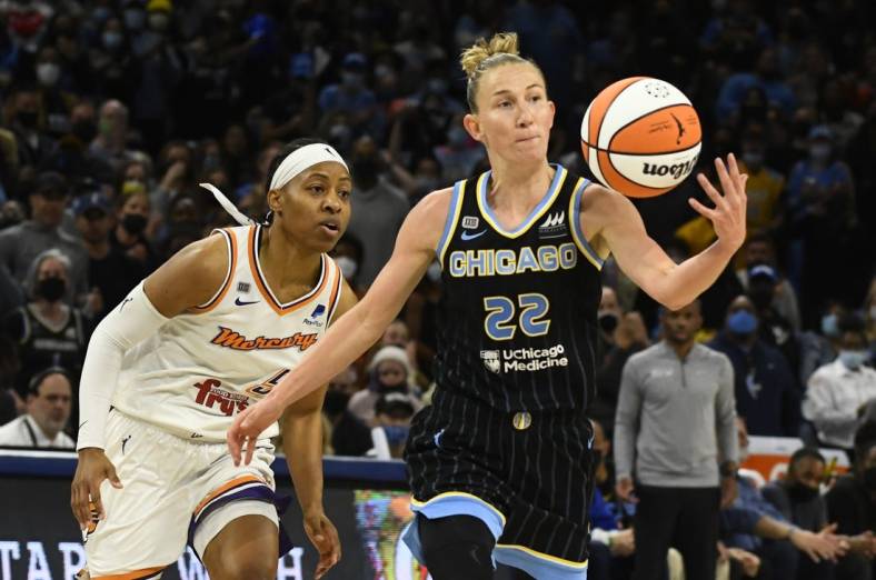 Oct 17, 2021; Chicago, Illinois, USA; Chicago Sky guard Courtney Vandersloot (22) and Phoenix Mercury guard Shey Peddy (5) during the second half of game four of the 2021 WNBA Finals at Wintrust Arena. Mandatory Credit: Matt Marton-USA TODAY Sports
