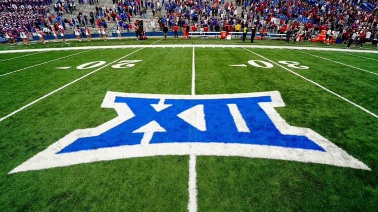 Oct 23, 2021; Lawrence, Kansas, USA; A general view of the Big 12 Conference logo on the field after the game between the Kansas Jayhawks and the Oklahoma Sooners at David Booth Kansas Memorial Stadium. Mandatory Credit: Jay Biggerstaff-USA TODAY Sports