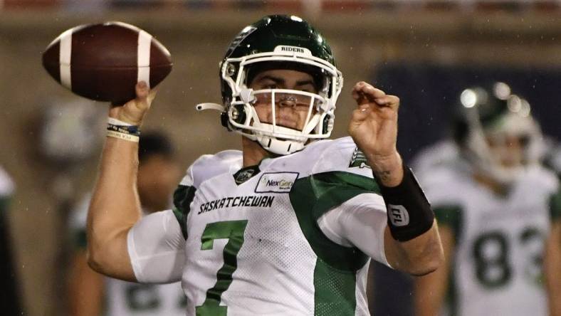 Oct 30, 2021; Montreal, Quebec, CAN; Saskatchewan Roughriders quarterback Cody Fajardo (7) throws a pass against the Montreal Alouettes in the fourth quarter during a Canadian Football League game at Molson Field. Mandatory Credit: Eric Bolte-USA TODAY Sports