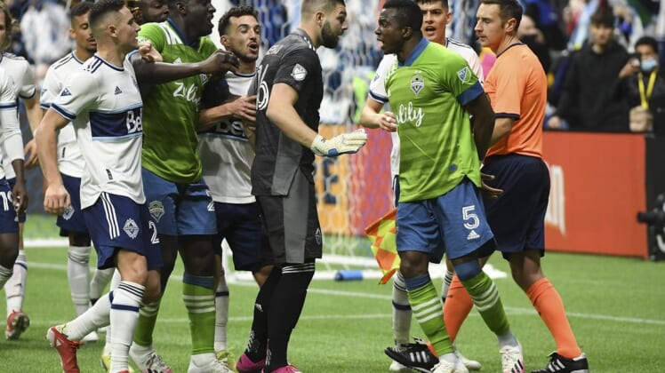 Nov 7, 2021; Vancouver, British Columbia, CAN;  The Seattle Sounders and the Vancouver Whitecaps exchange words during the second half at BC Place. Mandatory Credit: Anne-Marie Sorvin-USA TODAY Sports